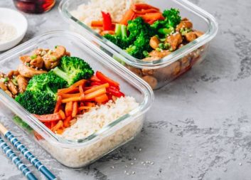 Chicken teriyaki stir fry meal prep lunch box containers with broccoli, rice and carrots
